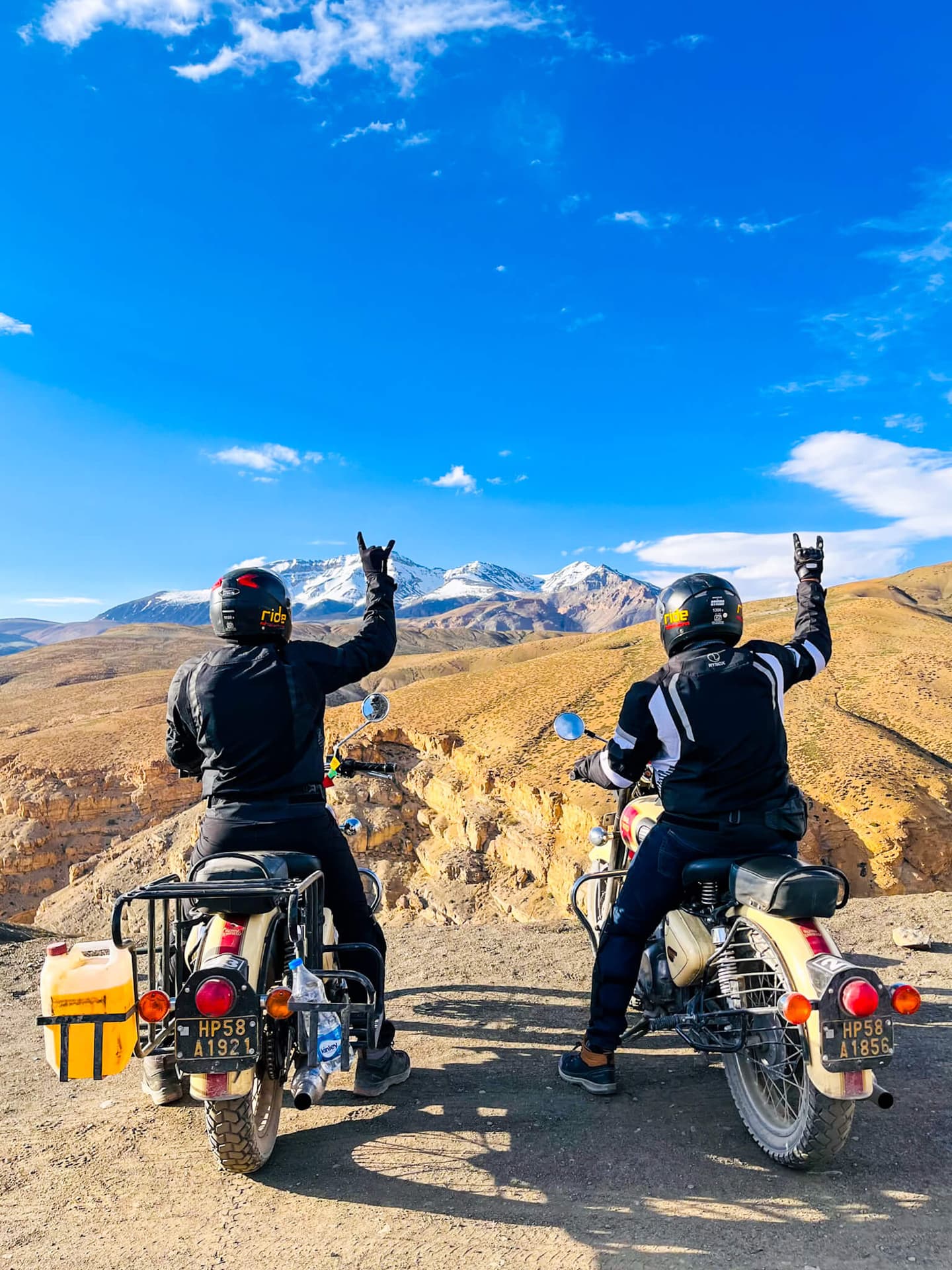 Travellers exploring a scenic mountain landscape
